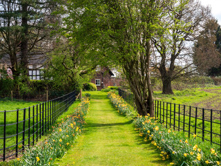 Trail leading to a countryside cottage during spring time, England, UK