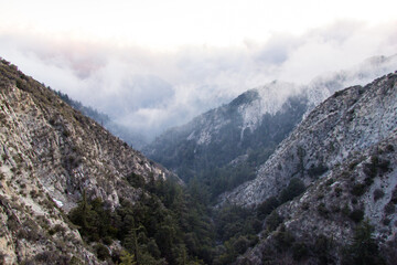 Watching the sunset over the clouds, looking over the city of Los Angeles. Views from Angeles National Forest