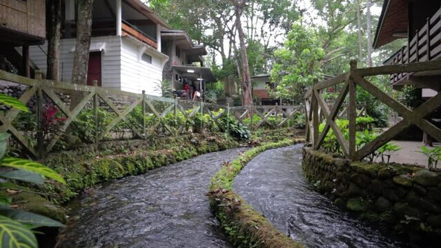 wooden bridge over river from bato spring laguna