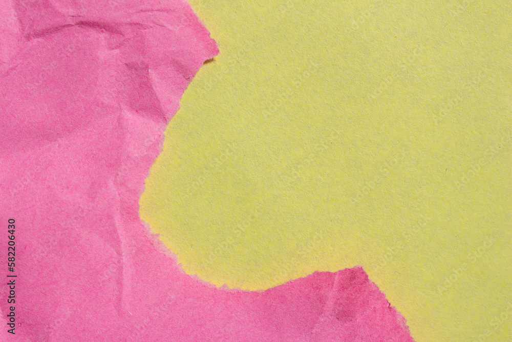 Poster crumpled pink paper piece on a yellow background. torn paper texture background with copy space for 