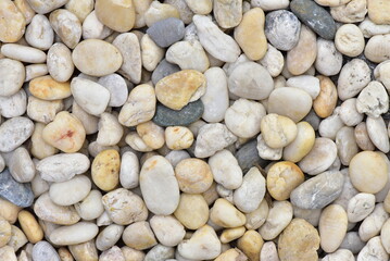Close-up round and oval multicolored river stones