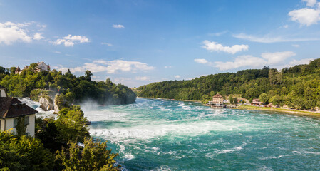 Aerial photography with drone of Rhine Falls with Schloss Laufen castle, Switzerland. Rhine Falls is the largest waterfalls in Europe