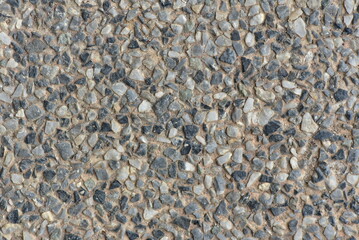 Many small stone backgrounds with gray and white in cement.