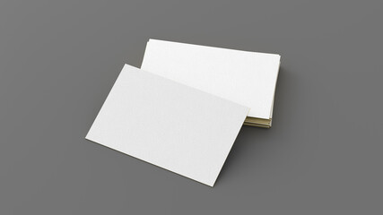 Business card with gold trim mockup. Stack of business cards on gray background. Side view
