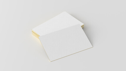 Business card with gold trim mockup. Stack of business cards on white background. Side view