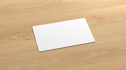 Business card mockup. Single business card on wooden background. Side view
