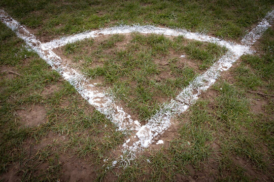 Local muddy football pitch with fresh corner markings