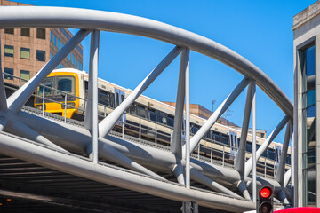 Railway overpass with a train leaving from London Bridge station in London, England - obrazy, fototapety, plakaty