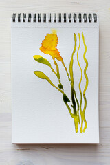 Watercolor sketchbook with flowers