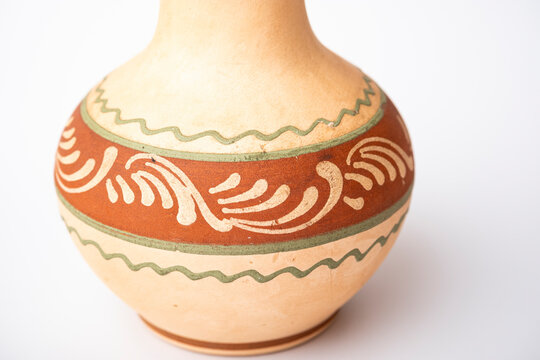 Clay jug isolated on white background	