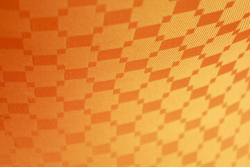 orange table cloth. orange background  is a grid.