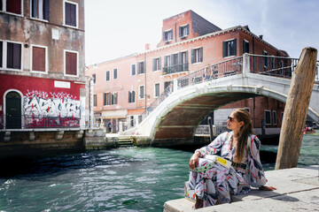 woman in city grand canal