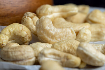 Fresh peeled cashew nuts on the table