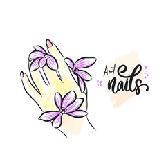 Delicate flowers on the hand with a beautiful manicure, hand lettering