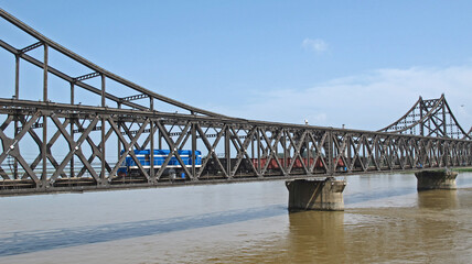 Train coming entering China from North Korea through Linjiang Yalu River Bridge