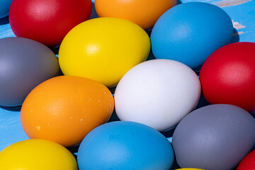 eggs painted in different colors to symbolize the passage of Christian Easter