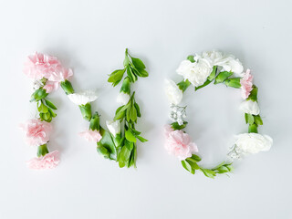 The word NO from flowers on a white background.