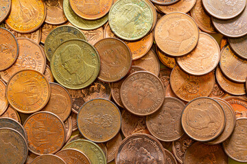 Macro baht coin,Macro coin,Double Exposure of Coins ,Piles of coins on the table.Money thai coins background. Various coins used in Thailand 