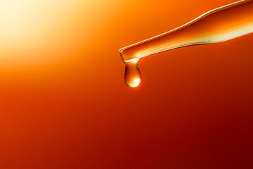 Macro science experiment pipette surface,Top view macro shot of chemical dropper injects oil into...