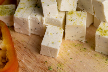 sliced white cottage cheese with spices