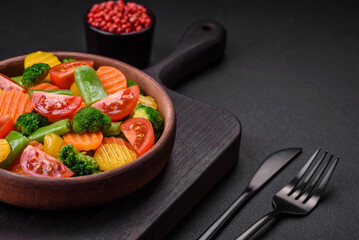 Salad of fresh and steamed vegetables cherry tomatoes, broccoli and carrots