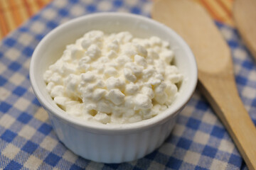 cottage cheese in a bowl on table 