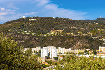 Obraz premium Mount Gros and Alpes hills with Astronomical Observatory over Paillon river valley seen from Cimiez district of Nice on French Riviera Azure Coast in France