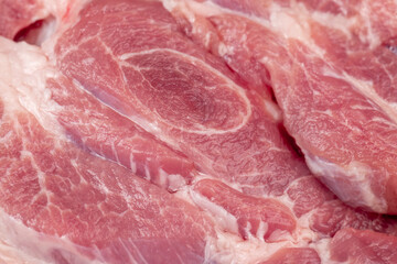 A cut piece of pork close up