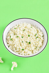Raw cauliflower rice in bowl