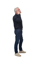 Naklejka premium man making phone gesture with his hands and looking up white background