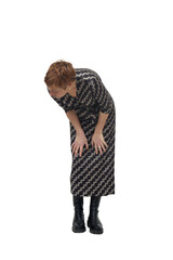 woman crouched looking at something on the ground on white background