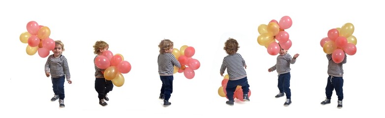 Fototapeta na wymiar group of same baby boy playing with a air balloon standing on white background