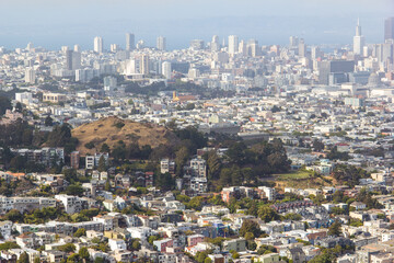 Aerial views of San Francisos cityscape in its classic fog.