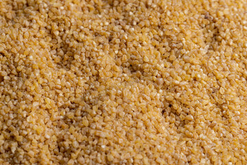 Fresh wheat porridge but cooked scattered on the table
