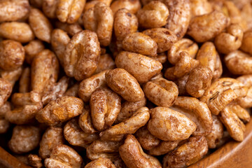 Airy wheat covered with a thin layer of cocoa chocolate