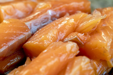 Sliced red trout meat with sea salt