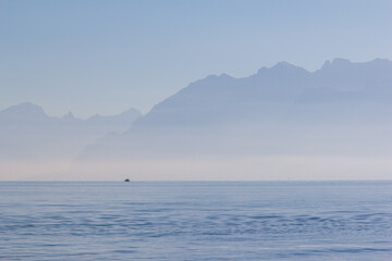 Idyllic and scenic landscape views of Lausanne, Switzerland. Large mountains and blue lake.