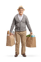 Full length portrait of an elderly man holding grocery bags