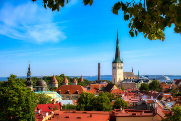 View of the Old City of Tallinn, Estonia, with City Wall Towers and St Olaf’s Church, as Seen...