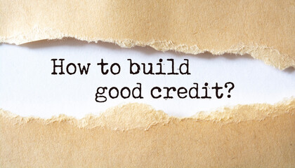 How to build good credit?. Words written under torn paper.