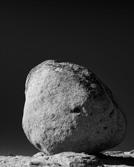 Large Boulder Balanced At The Top of Hill