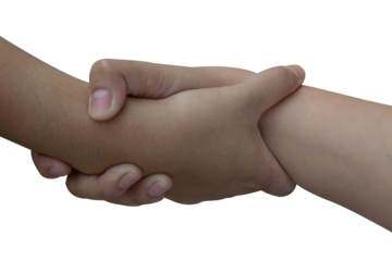 Male and female hands with different skin tones holding each other. a helping hand concept of friendship support trust teamwork success.