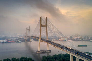 Fototapeta na wymiar Phu My bridge in the beautiful twilight sunset in Sai Gon city, Viet Nam.