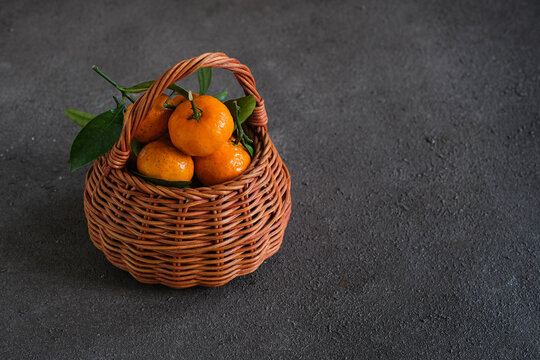 jeruk santang madu (Citrus sinensis) on dark background. often consumed during Chinese new year
