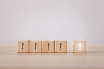 wooden blocks with exclamation marks arranged or arranged