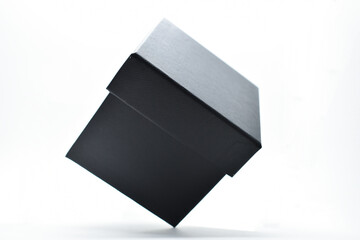 black paper box on white background, packaging industry