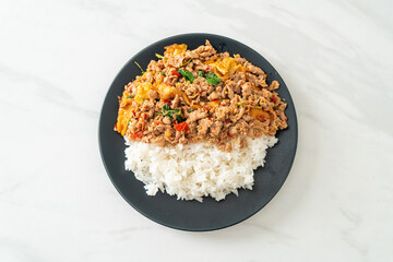 stir-fried minced pork with basil and egg topped on rice