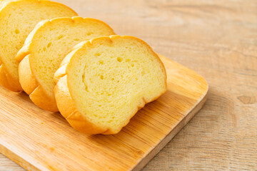 potatoes bread sliced on wood board