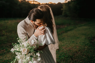 romantic couple in wedding outfit