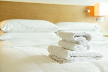 close-up white towel on bed